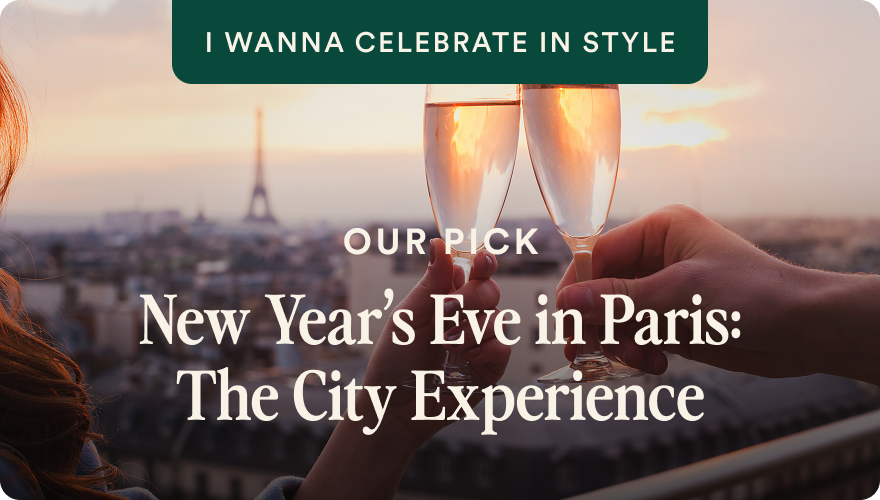 Champagne toast at sunset with the Eiffel Tower and I Wanna Celebrate in Style and New Year’s Eve in Paris: The City Experience tour badges; opens itinerary