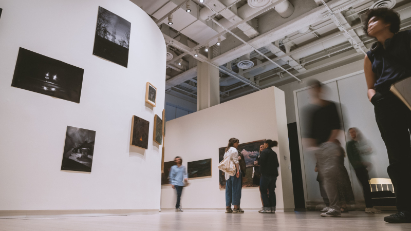 Patrons observing an exhibition at Lenfest Center for the Arts