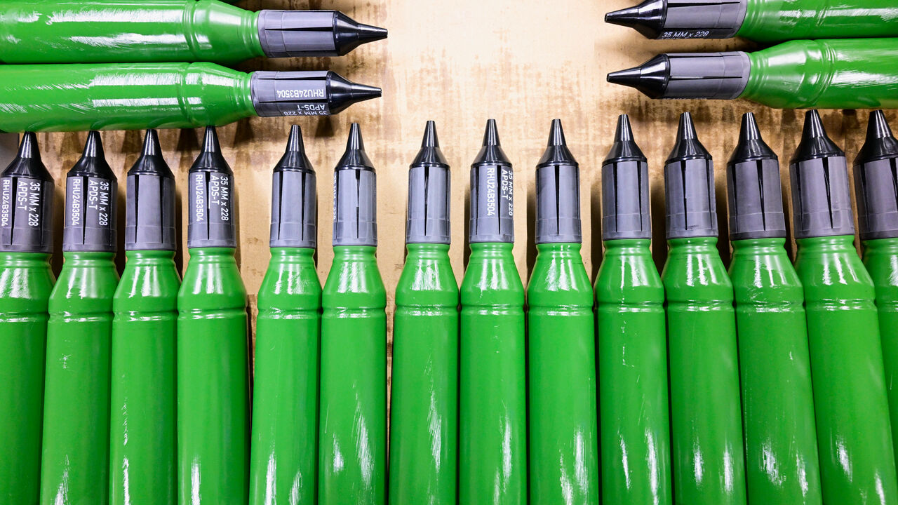 Colourful green ammunition is seen at a production line munitions factory of German defence contractor Rheinmetall in Unterluess, Germany.