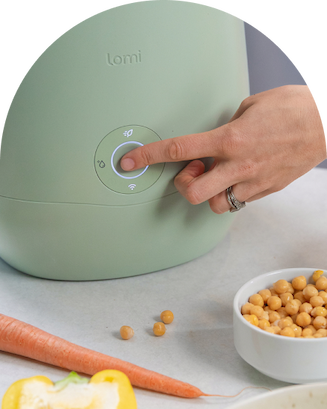 Pressing button on Sage Green Lomi 3 