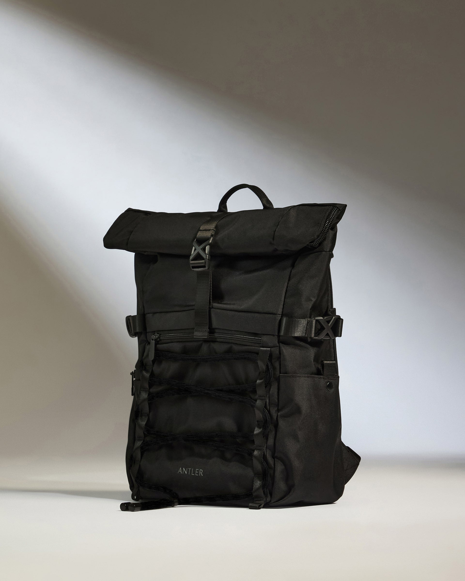 Image of Discovery Roll Top Backpack in Black