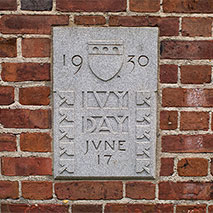The 1930 Ivy Stone in a brick wall.