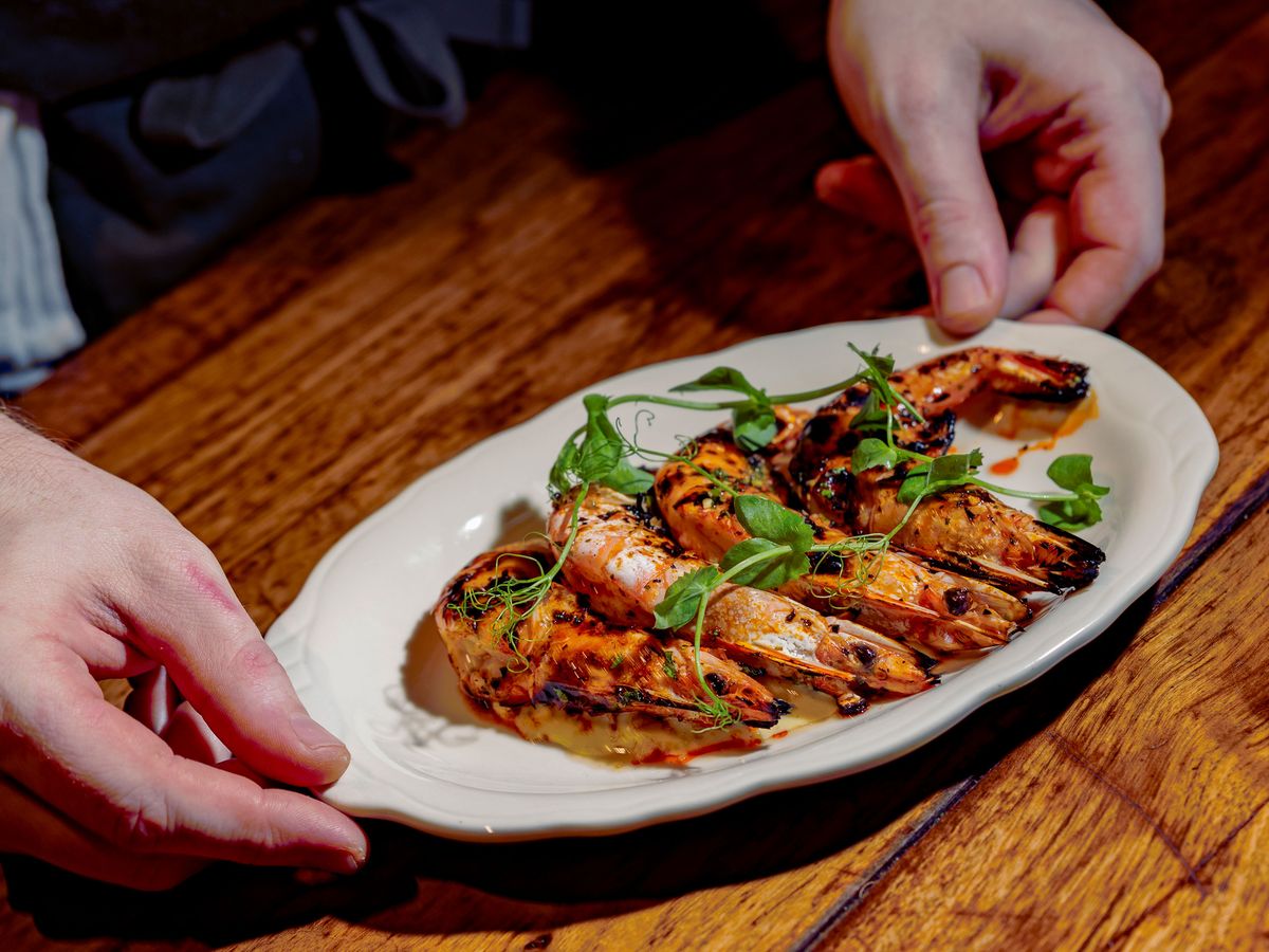 Grilled shrimp on a plate.