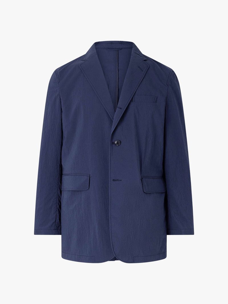 Image may contain: Blazer, Clothing, Coat, Jacket, Formal Wear, and Suit