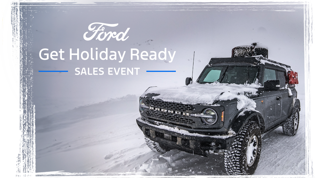 A Bronco&reg; Sport SUV being driven on a snowy road, with the words &ldquo;Ford Get Holiday Ready Sales Event&rdquo; placed overtop the image