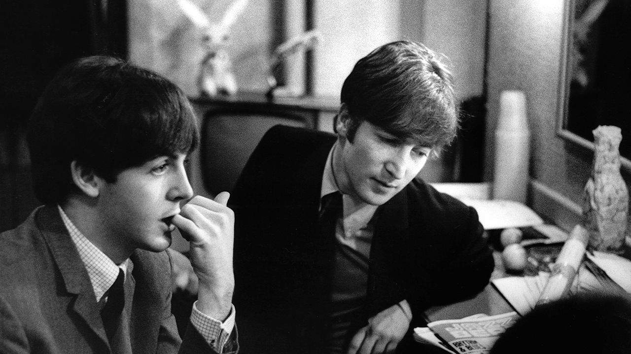 Paul McCartney and John Lennon backstage at the Finsbury Park Astoria, London on December 30th 1963