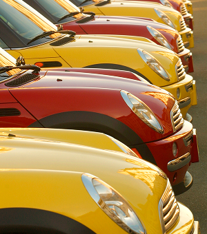A row of red and yellow MINIs
