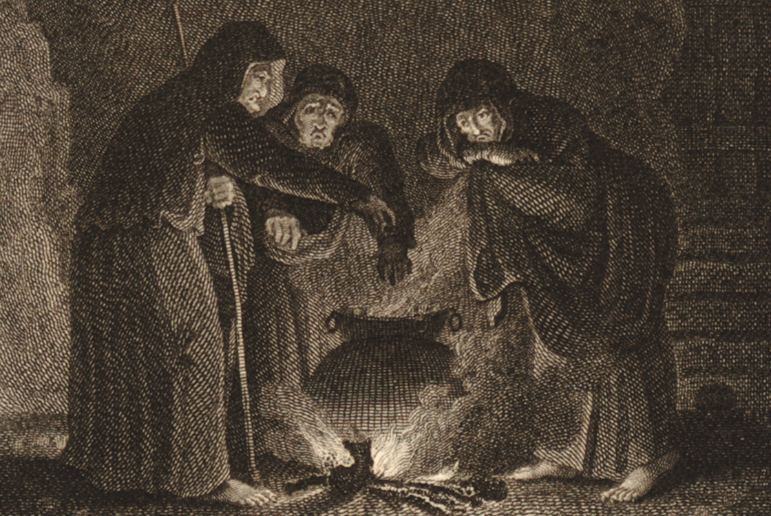 Three figures surrounding a cauldron. 