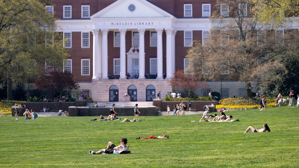 students lounge on McKeldin Mall