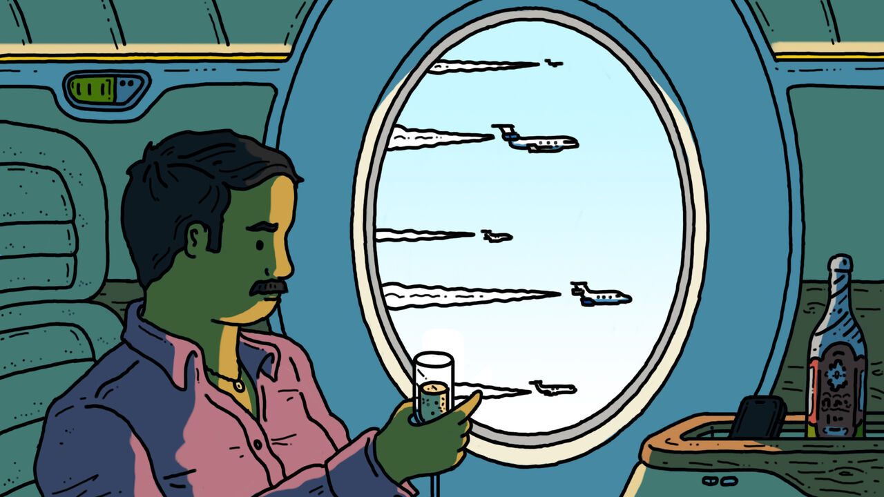 An Indian man sat in a private jet drinking champagne