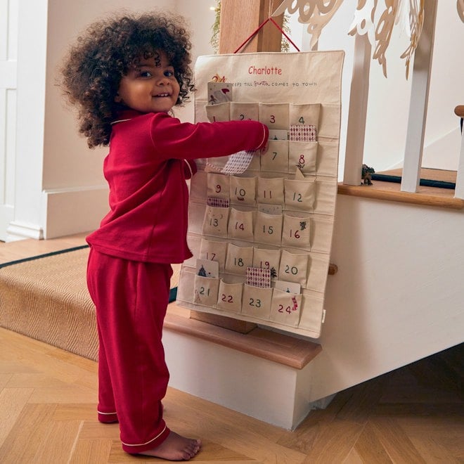 Toddler with advent calender