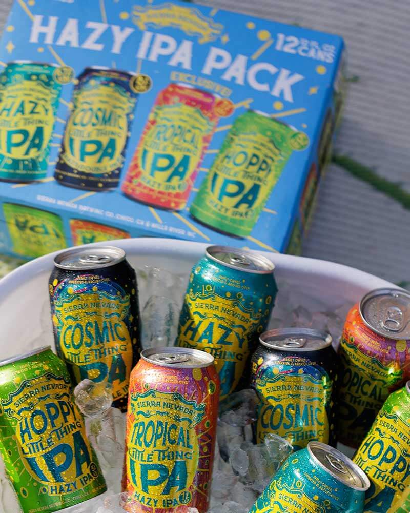 A Hazy IPA Pack next to an icy bucket full of beer cans