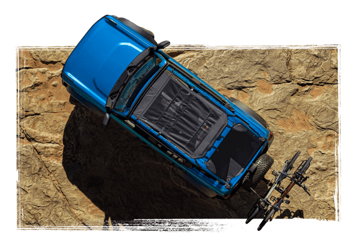 An overhead view of a Bronco&reg; SUV in a rocky landscape