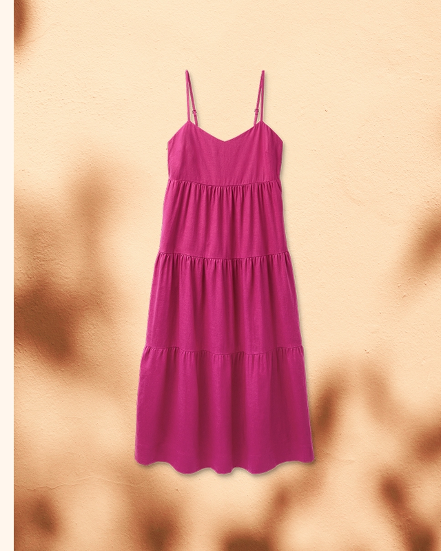 The Kathleen Dress is an effortless fuchsia maxi designed to go anywhere. With adjustable straps and a flattering empire waist, it's the perfect piece to wear on its own or layered year-round.