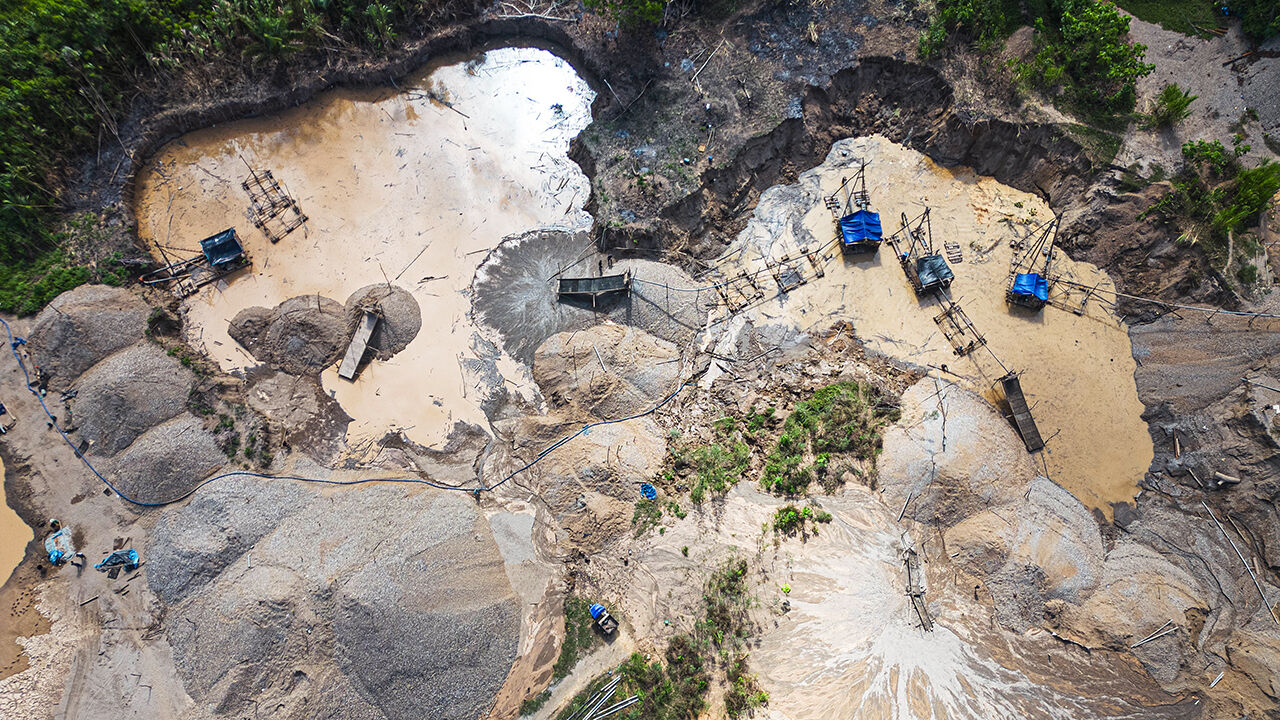 Aerial picture of dredges at an illegal gold mining area in the Madre de Dios department, in Peru.