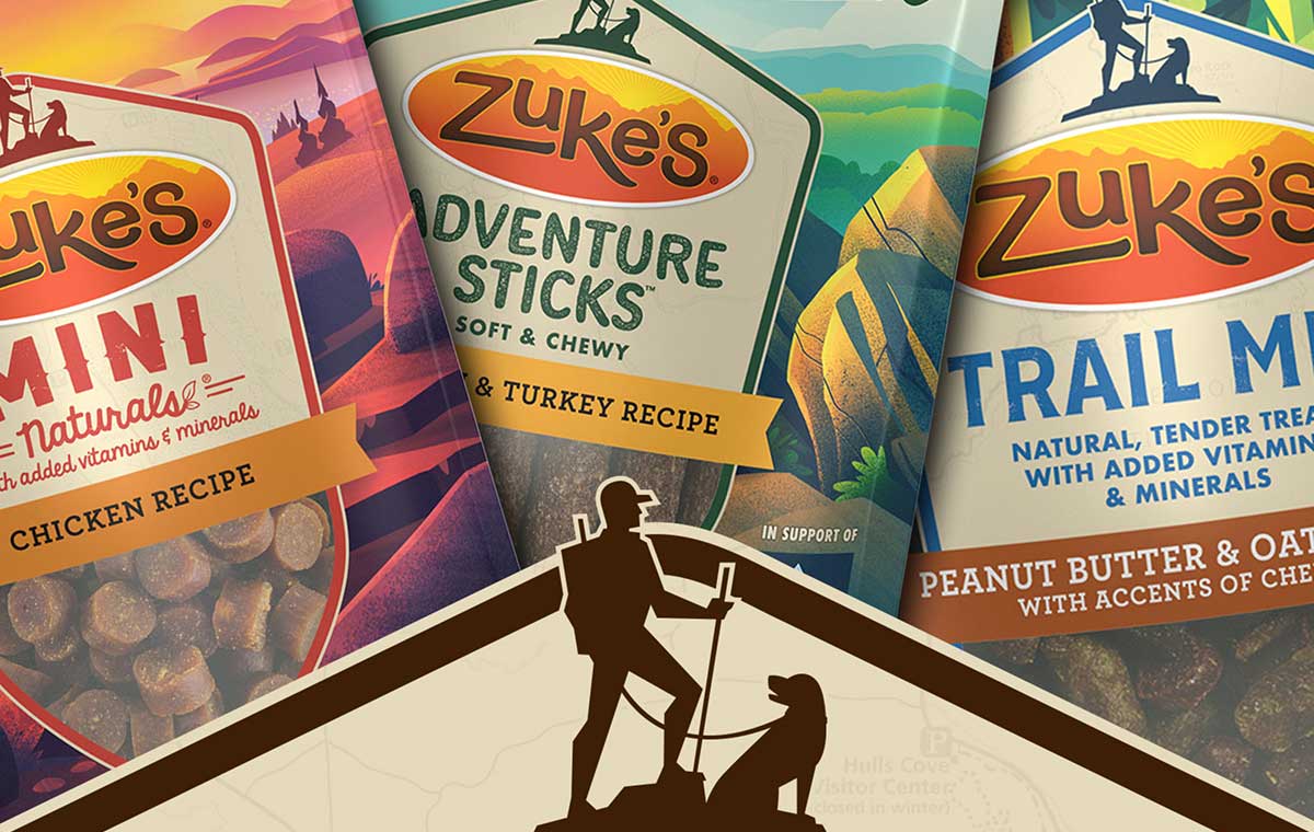 A silhouette of a hiker and their dog over bags of Zuke's dog treats.