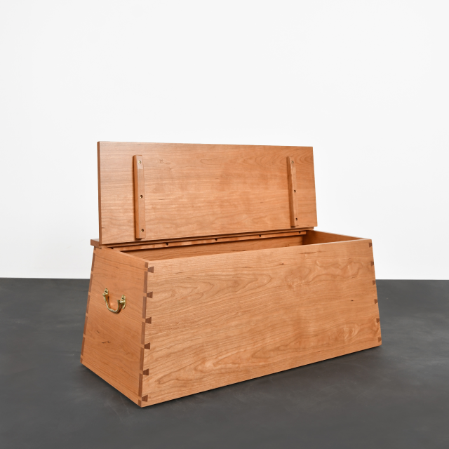 A cherry Captain's Chest with the top open.