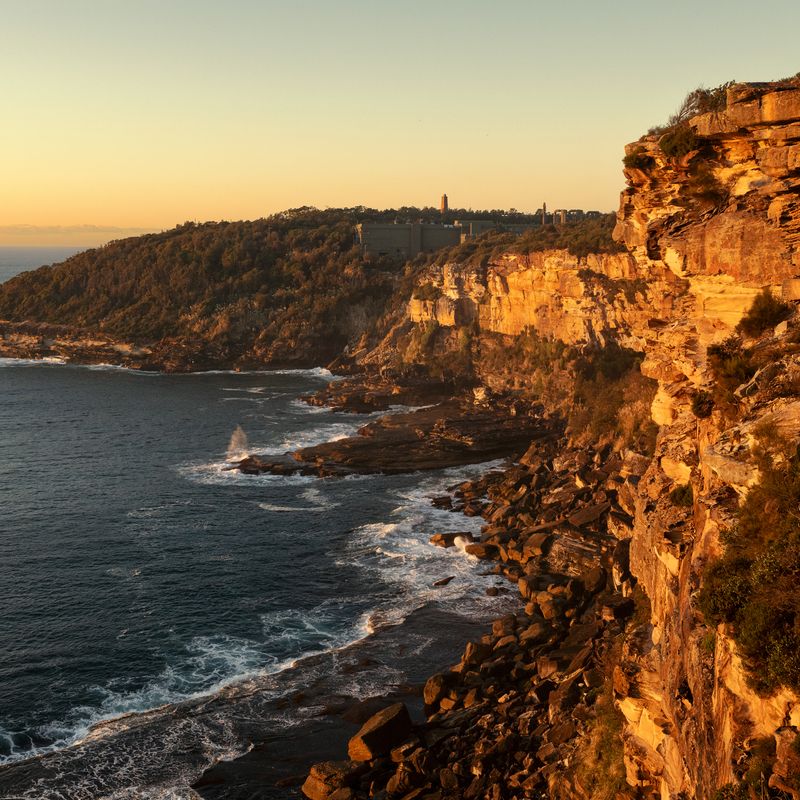 A cliff by a beach.
