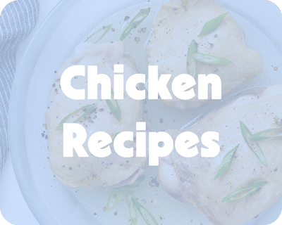 A blue-toned image of cooked chicken thighs garnished with green onions in a plastic-free Anyday dish, with bold white text that reads "Chicken Recipes."