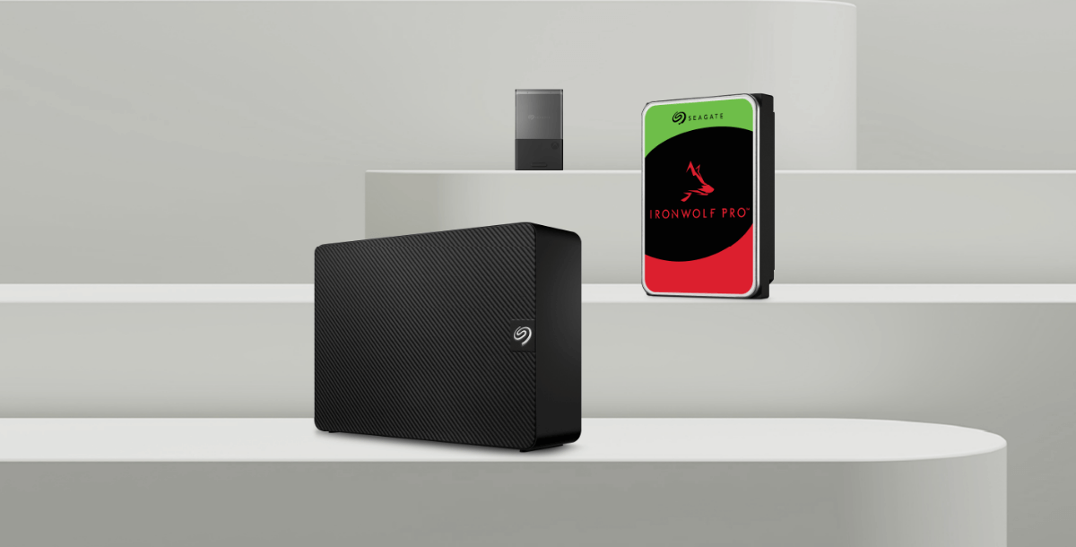 A selection of three Seagate products arranged on stepped white platforms.