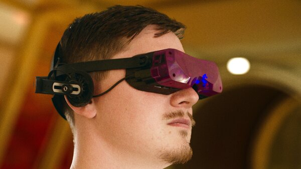 A man wearing a VRChat headset.