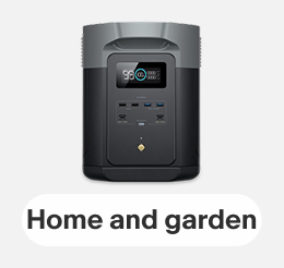 An EcoFlow DELTA 2 Max Portable Power Station on a gray tile.
