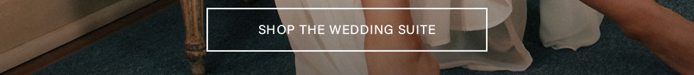 Shop The Wedding Suite button. Find wedding dresses, invitations, and bridal accessories.