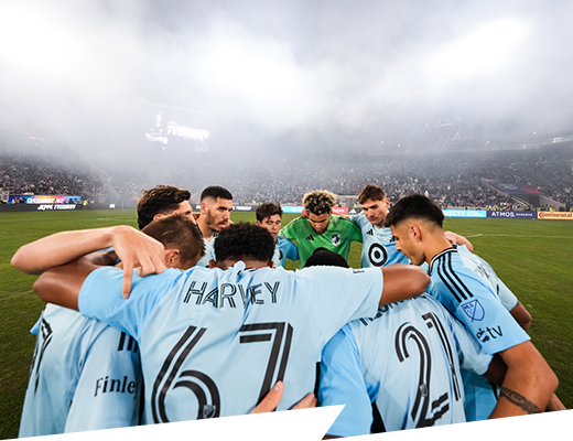 Team huddle before the final game of the season
