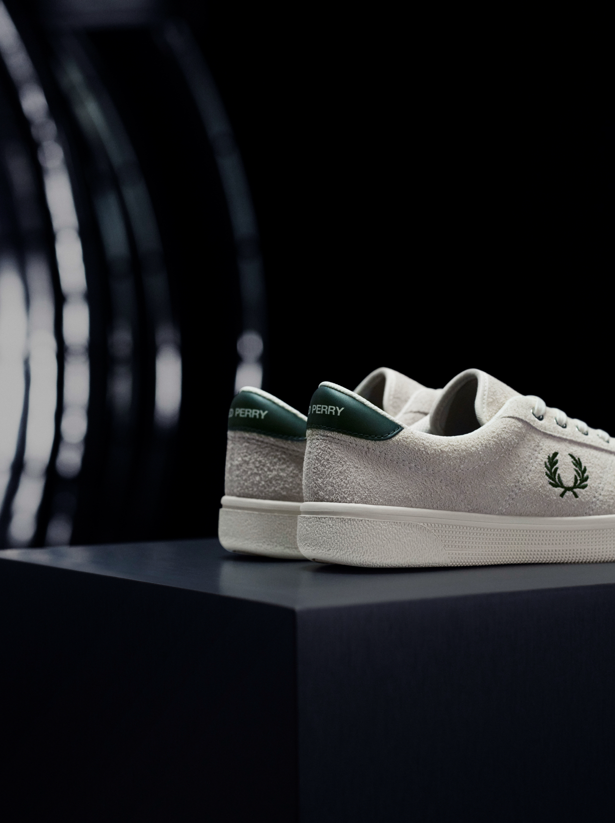 Close up of the Fred Perry Tennis Shoe in Ecru