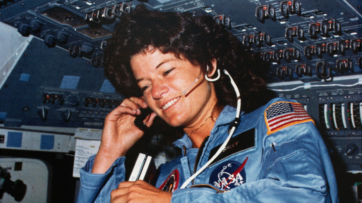 A photo of Sally Ride in a space shuttle.