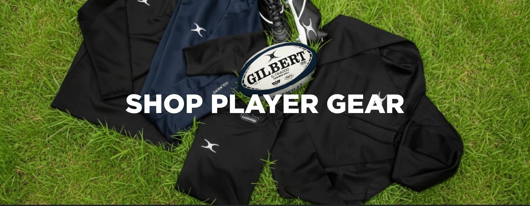 an image of a rugby player gear laying on the grass