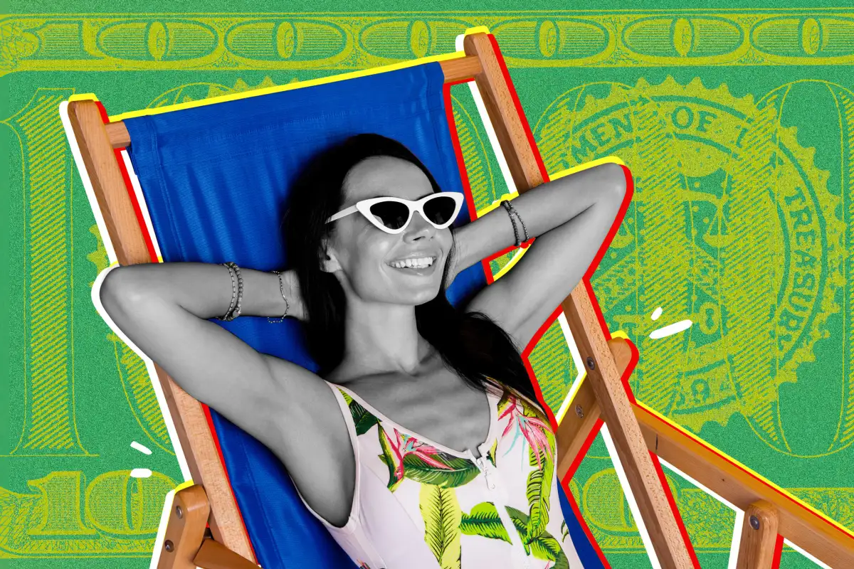 Young woman lying back on a lounge chair smiling