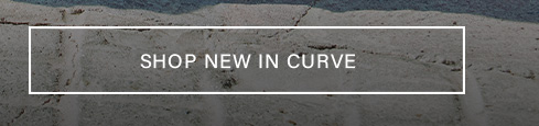 White "SHOP NEW IN CURVE" button over a textured gray background, inviting users to browse new arrivals in plus-size fashion.