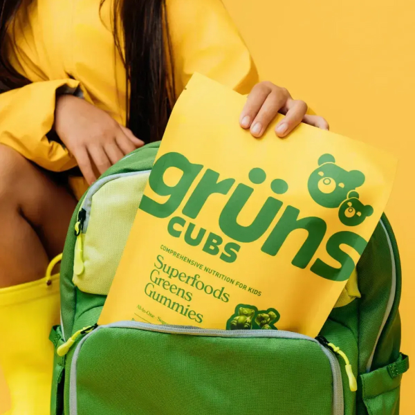 Closeup of Gruns being put in a backpack