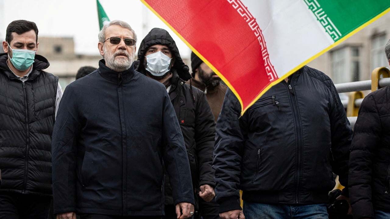 Iranian security chief Ali Larijani takes part in a pro-government rally in Tehran