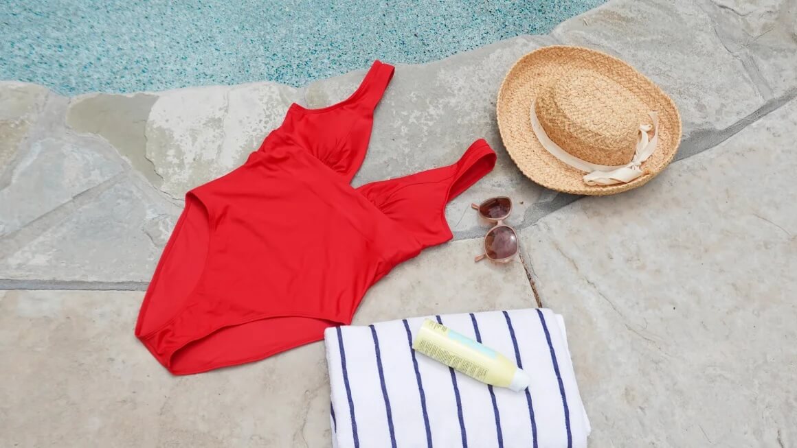Red swimsuit against a pool