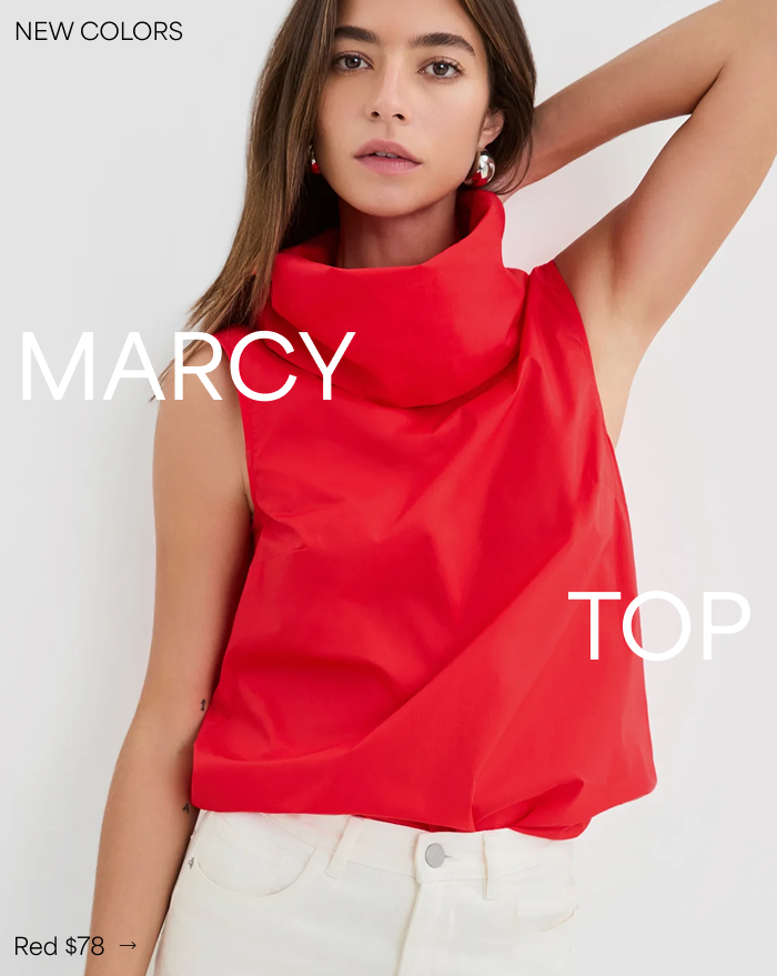 Rocio poses in the Marcy Sleeveless Top paired with white jeans, priced at $78.