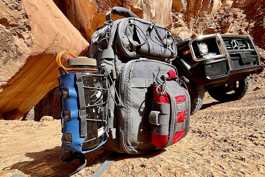 JAVELIN-18 bag using MOLLE to add a water bottle plus medical kit pouch