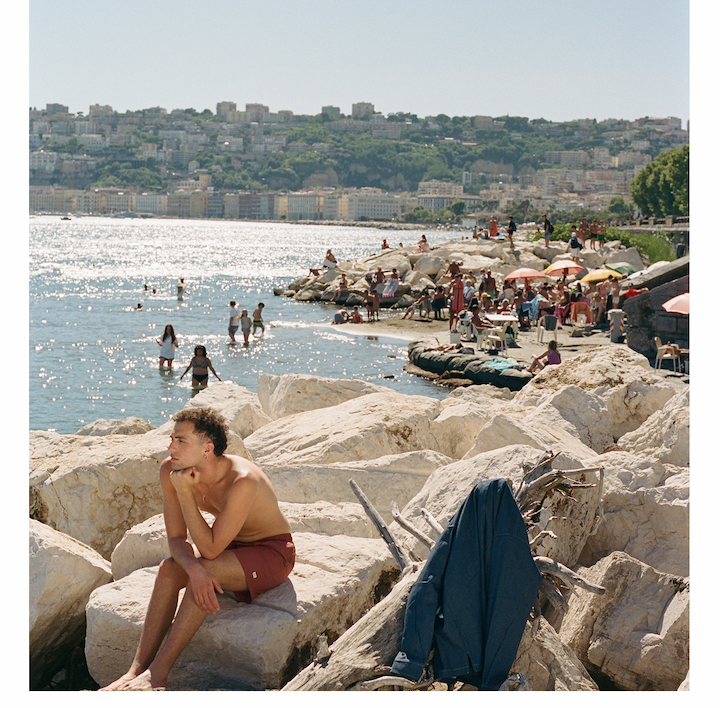 Man sitting on European beach