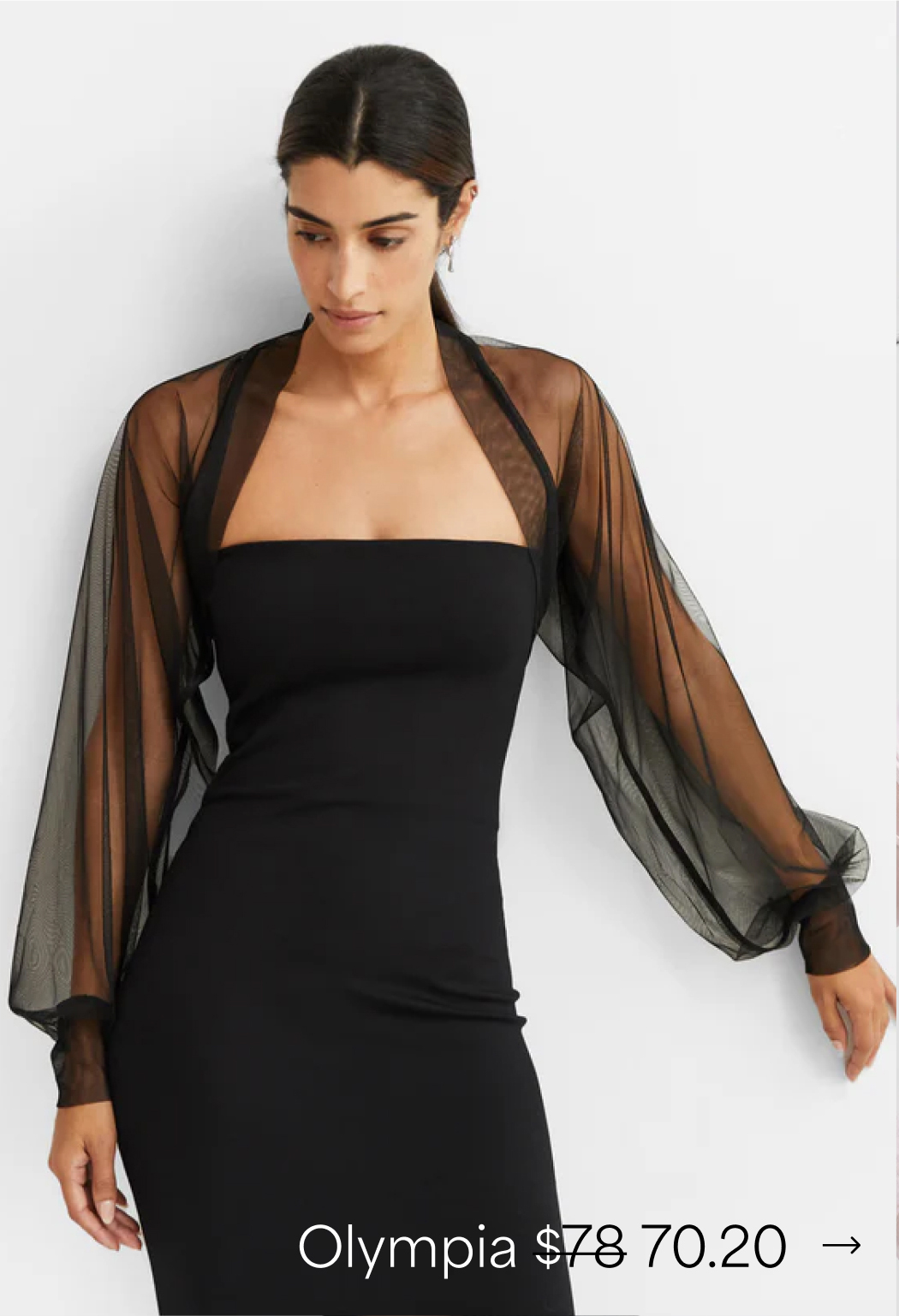 Sam in a strapless black dress layered with The Olympia Bolero.