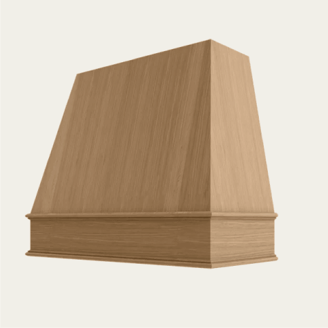 Wooden range hood with slanted sides.