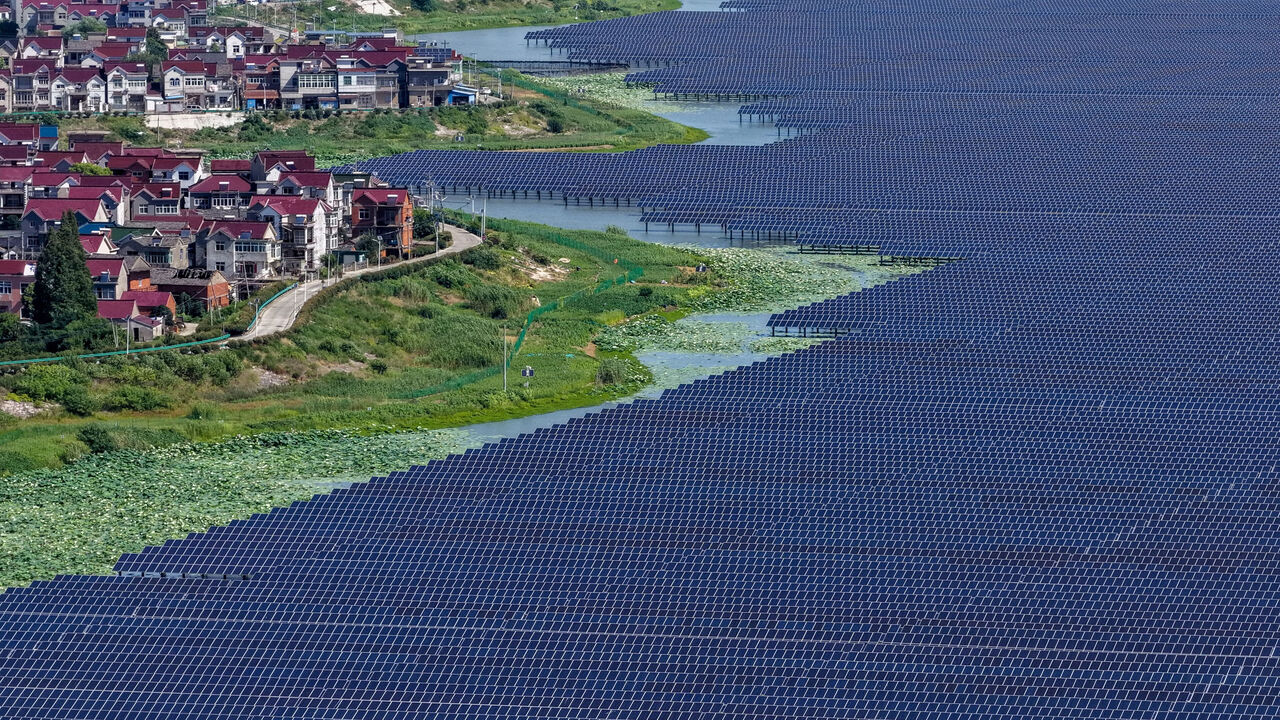 Aerial view of a 260MW solar farm spanning 4 square kilometers of aquatic farming water bodies in Dangtu County, central China's Anhui Province.
