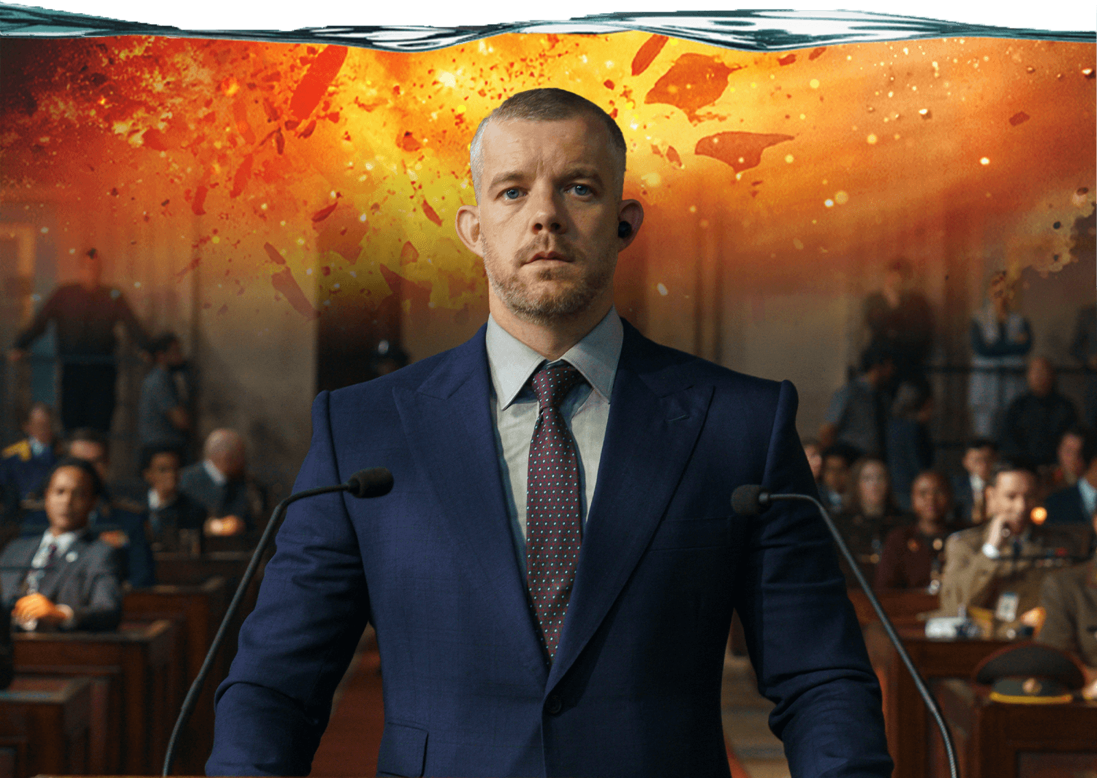 Barclay Pierre-Dupont, played by Russell Tovey, stands at a court podium in a suit.