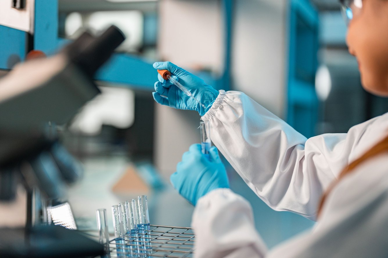 Young female scientist conducting research in a lab