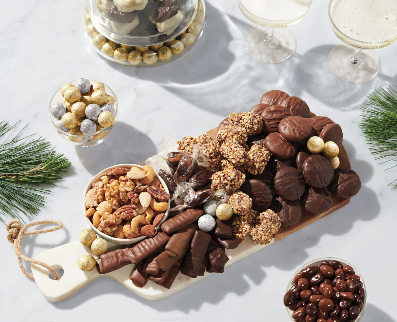 A festive spread of See&rsquo;s chocolate and nut treats