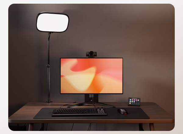 Key Light Air MK.2 on a stand beside a monitor, camera, and Stream Deck on a desk