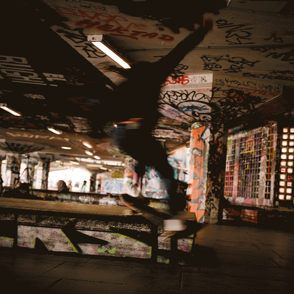 Scenes of skateboarders under an overpass.