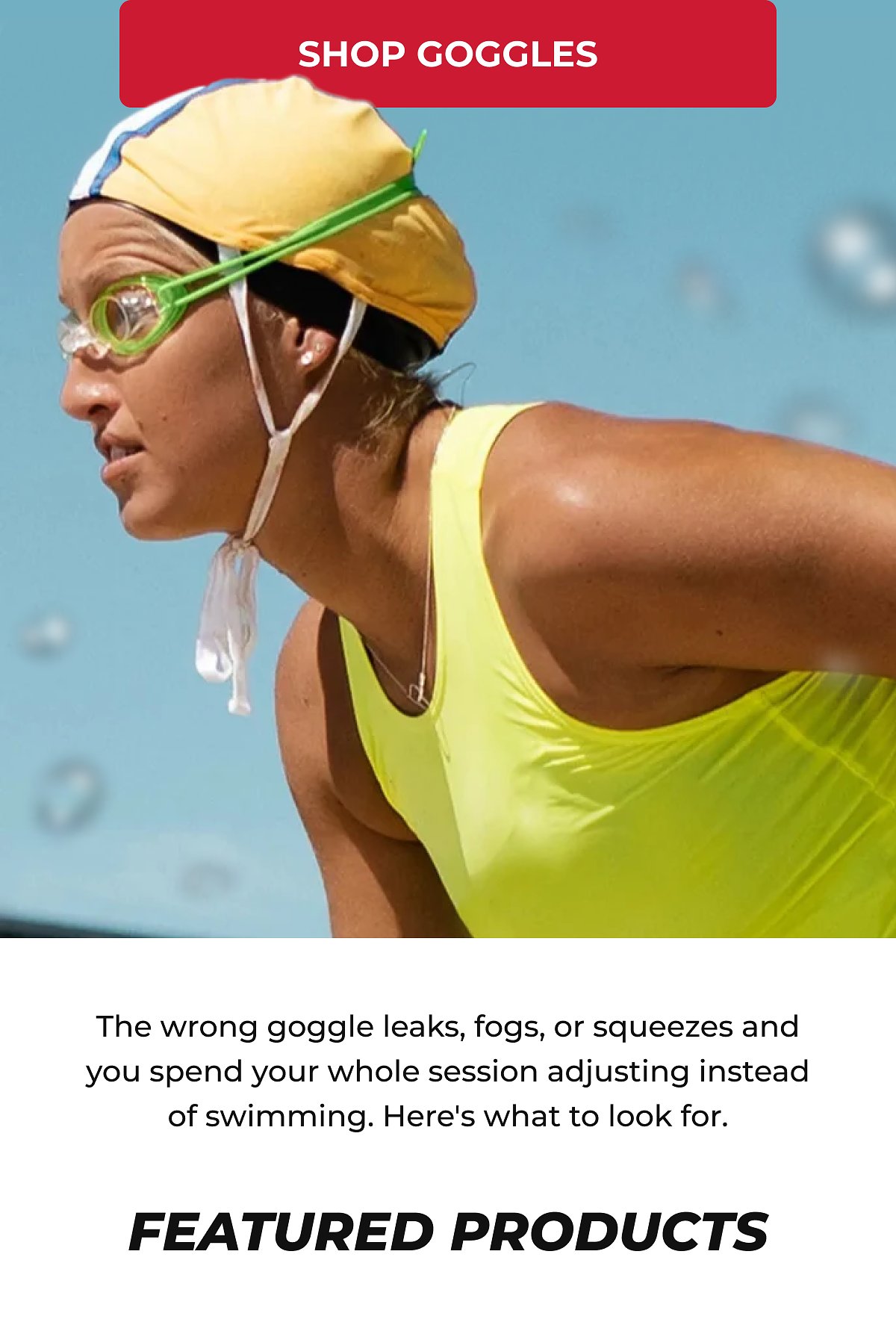 A swimmer adjusting their goggles, wearing a colorful swim cap and a bright swimsuit.