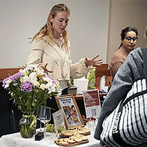 Emmy Keogh presenting her butter products to an audience.