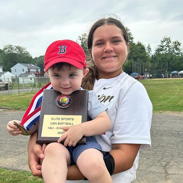 Kole Martel (left) and his sister, Kalina, celebrated a tournament win by her softball team in summer 2025